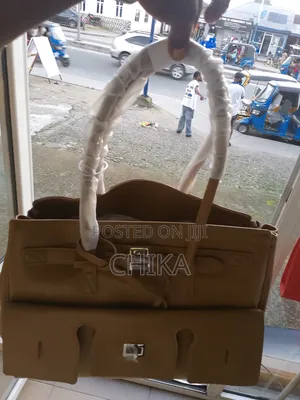 Sabbin Kyakkyawan Jakunkuna na China na Mata - Brown
