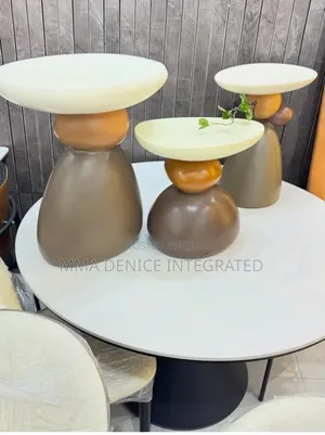 Modern Round Coffee Table - White Top, Sculptural Base