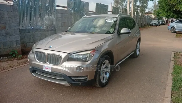 BMW X1 2013 Gold - 1