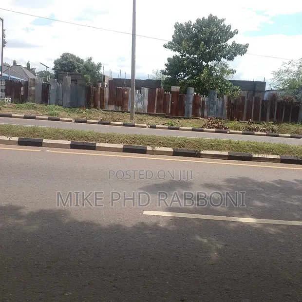 500 sqm Commercial Land with Uncompleted Plaza, Abakaliki Rd GRA Enugu - 1