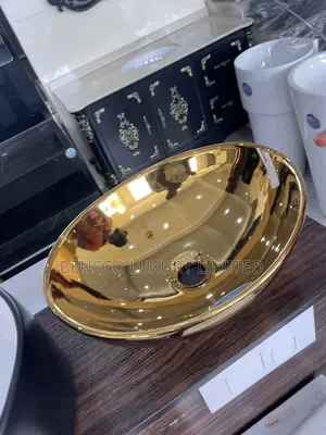 Oval Glossy Gold Ceramic Countertop Wash Basin