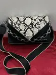 Charles & Keith Black Snakeskin Flap Crossbody Bag ta Asali - 1