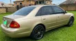 2004 Toyota Avalon XL Gold - 4