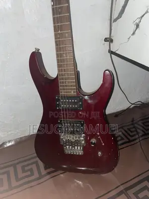 Used Red Electric Guitar - Intermediate