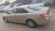 Toyota Camry LE 2010 Gold - 1