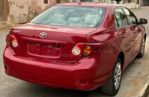2009 Toyota Corolla Red - Foreign Used