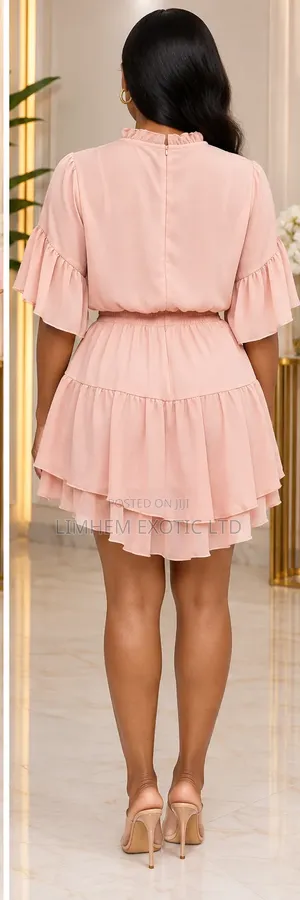 Short Light Pink Ruffled Romper