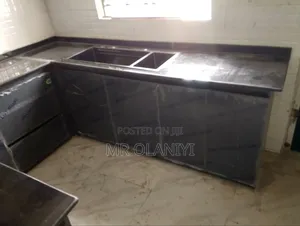 Brand New Kitchen Cabinets with Black Marble Top