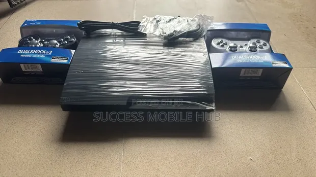 PlayStation 3 Slim - Hacked, 500GB, 2 Controllers - 1