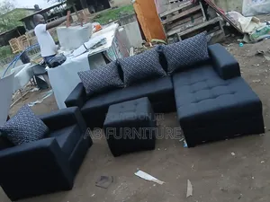 Home Interiors L-Shape Sofa with Center Table - Brand New