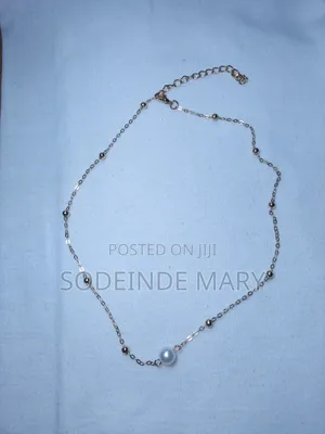 Elegant Golden Alloy Necklace with White Imitation Pearl Pendant