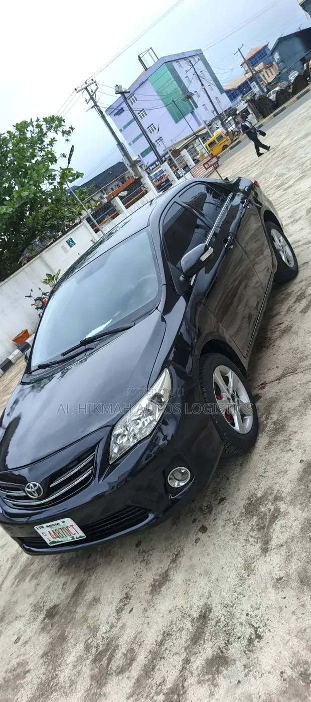 2012 Toyota Corolla LE Sedan - Black - 1