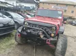 2014 Jeep Wrangler Unlimited Sahara SUV 4WD Red - 1