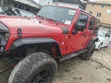 2014 Jeep Wrangler Unlimited Sahara SUV 4WD Red - 2