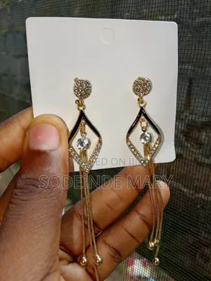 Celestria Crystal Drop Gold Plated Tassel Earrings