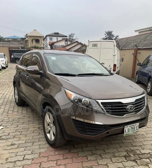 Kia Sportage 2013 Brown - 1