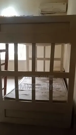 Used Off-White Bunk Bed with Drawer