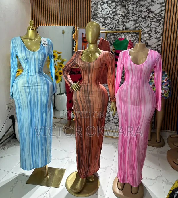 Ladies Quality Gowns, Tops, and Two Pieces - Wholesale & Retail - 1