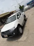 Mitsubishi L200 Double Cab 2.5 136hp 4WD 2012 White - 4