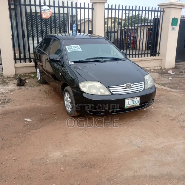 Toyota Corolla 2004 Baƙi - 1
