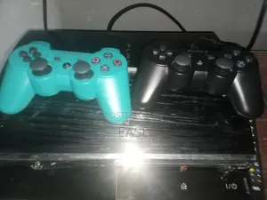 Playstation 3 with 10 Games and 2 Controllers