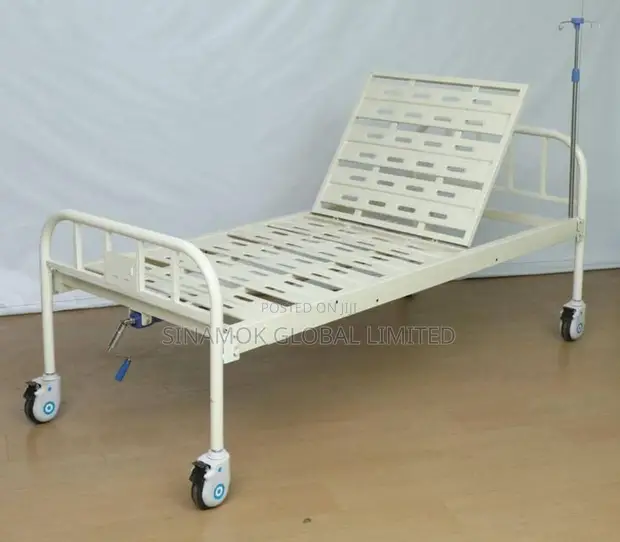 Manual Hospital Bed with Backrest Adjustment and IV Pole - 1