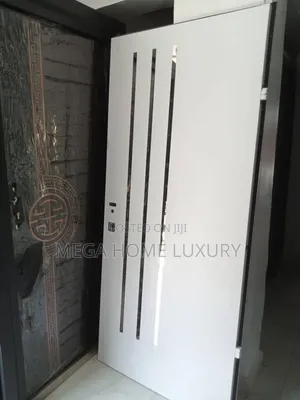 Modern White Slatted Door with Glass Accents