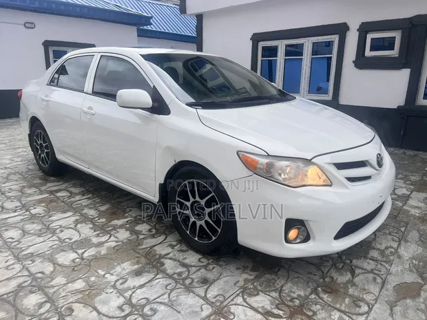 2013 Toyota Corolla LE Sedan - White - 1