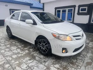 2013 Toyota Corolla LE Sedan - White