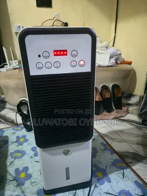 Used Cooling and Heating Fan with Humidifier & Fragrance