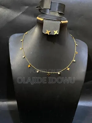 Kugun Zobe na Bakin Karfe (Figure 8 Necklace)