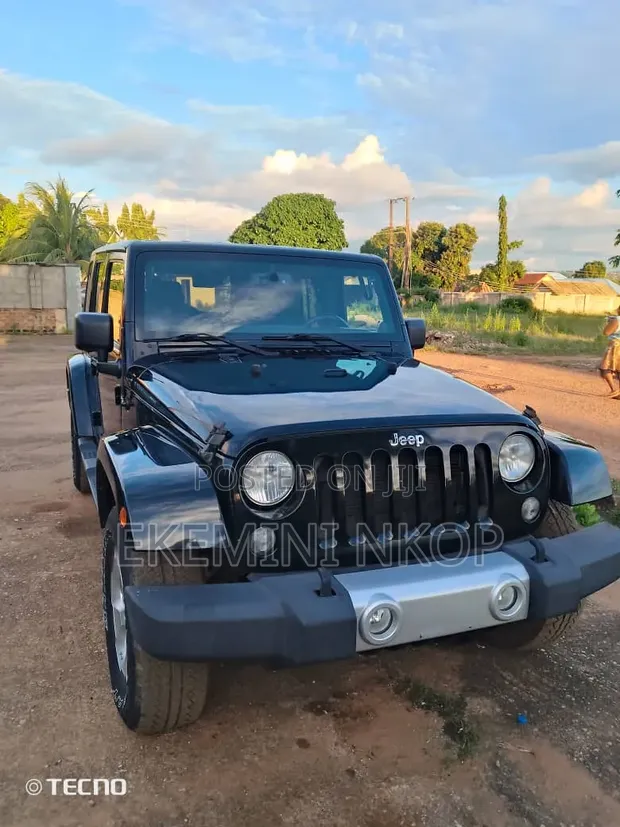 2014 Jeep Wrangler Unlimited Sahara 4dr SUV 4WD - 1