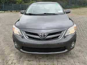2011 Toyota Corolla LE Sedan - Wata Kasar Ta Fito