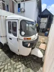 Bajaj 2010 White Three-Wheeler - 1