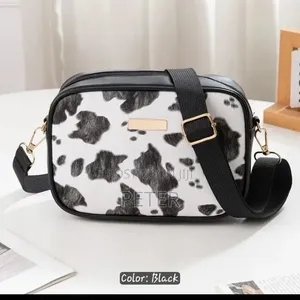Unisex Cow Print Crossbody Bag
