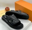 Louis Vuitton Men's Black Leather Slippers - 1