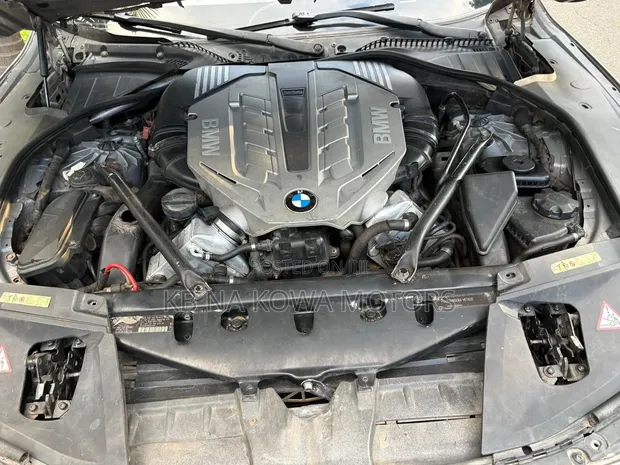 BMW 7 Series 740i 2014 Gold Sedan - 1