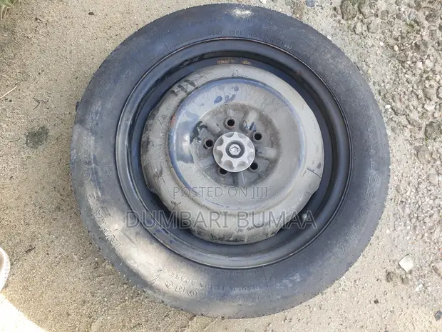 Brand New Toyota Corolla Spare Tire - 1