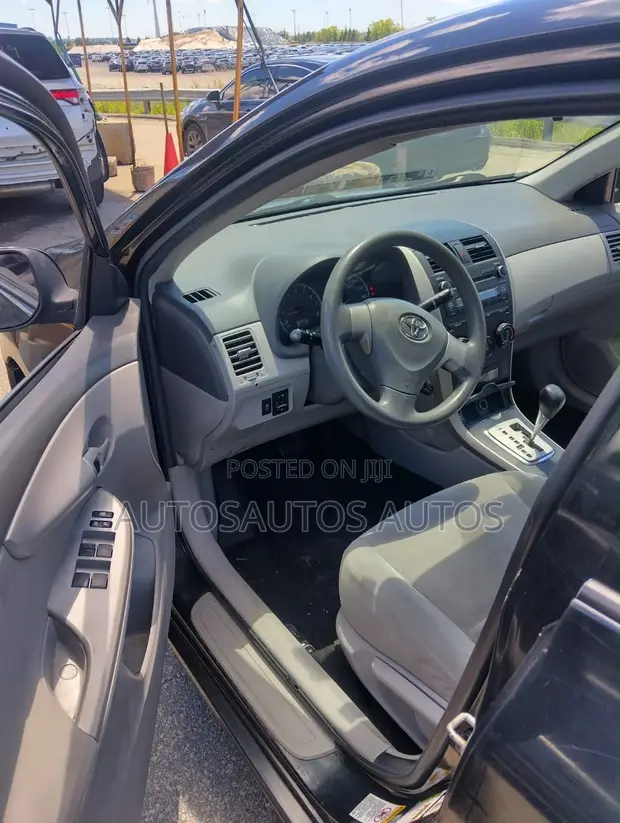 2010 Toyota Corolla LE Sedan - 1