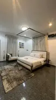 Kyakkyawan Apartment Mai Dakuna 2 don Saka na Ɗan Lokaci a Guzape, Abuja - 1