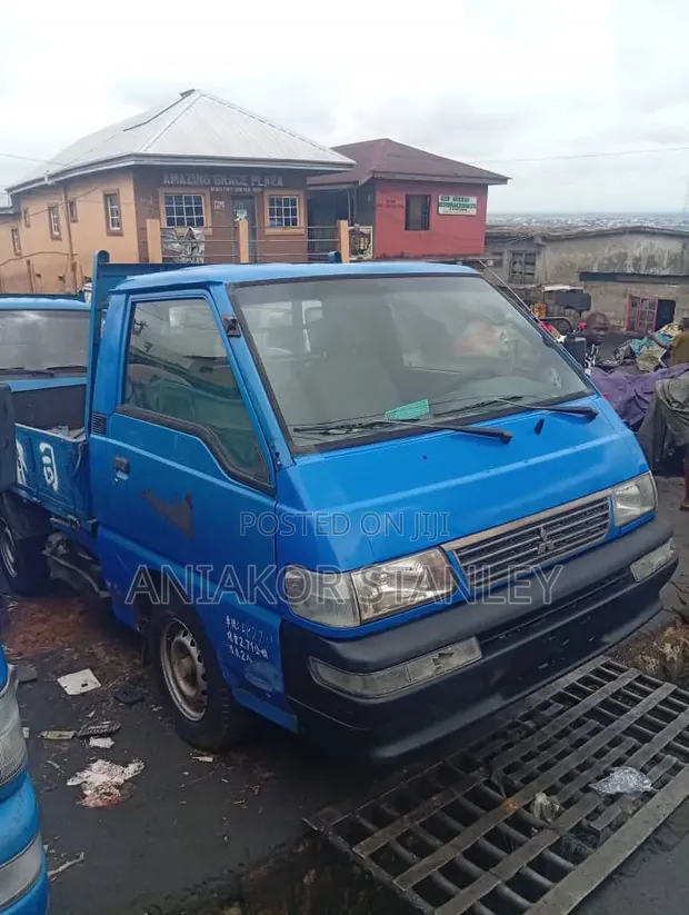 Anibenchus Motors: Mitsubishi Delica & Ford Econovan Trucks - 1
