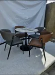 Modern Round Marble Dining Table tare da 4 Cushioned Chairs - 1