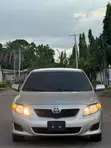 Toyota Corolla 2010 Zinariya - 4