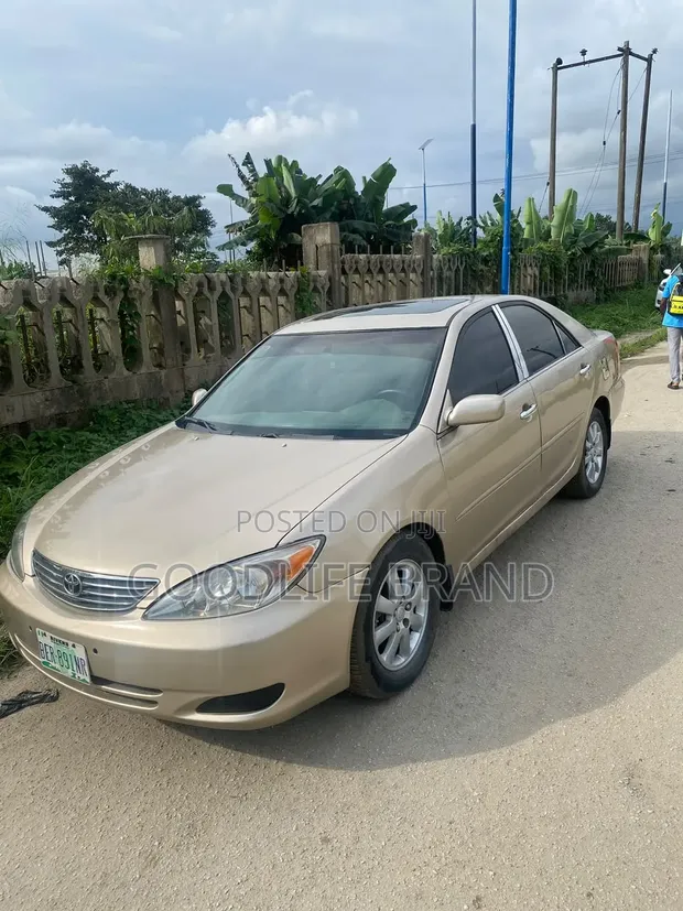 Toyota Camry STD 2.4L Zinariya 2006 - 1