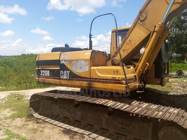 Caterpillar 320BL Excavator - 1