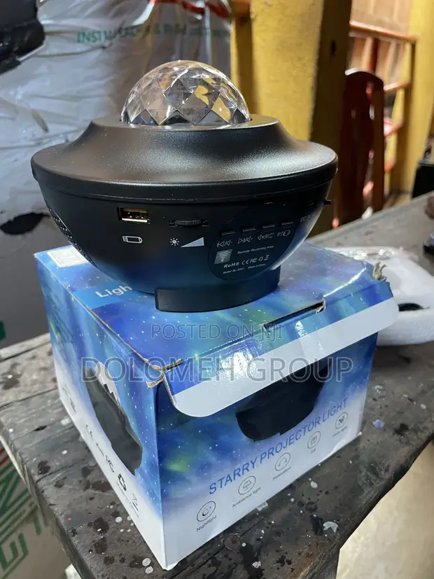 Starry Projector Light with Moon & Stars - 1