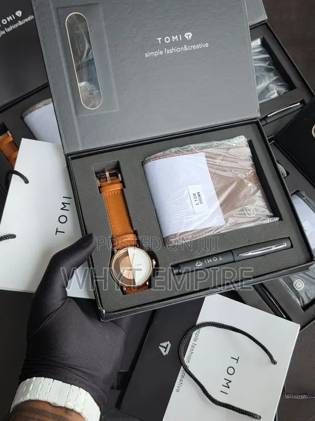 New Tomi Wristwatch with Extra Strap - 1