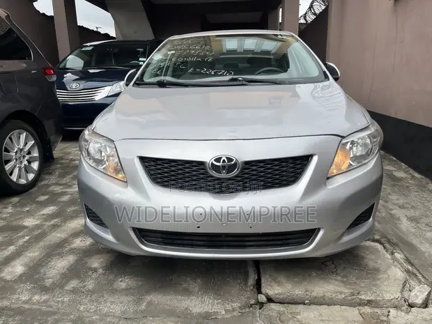2010 Toyota Corolla Base Sedan (1.8L) - Silver - 1