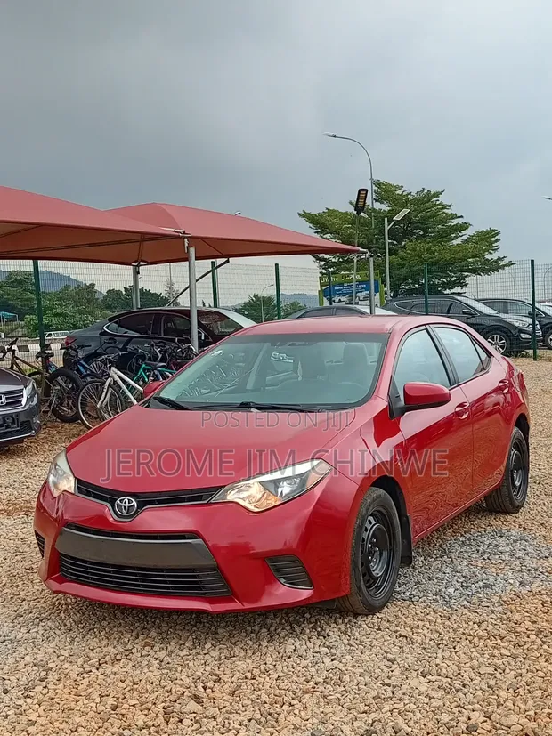 2015 Toyota Corolla Red - 1