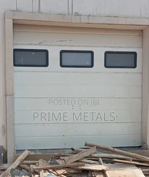 Brand New Sectional Overhead Garage Door (White Aluminum)
